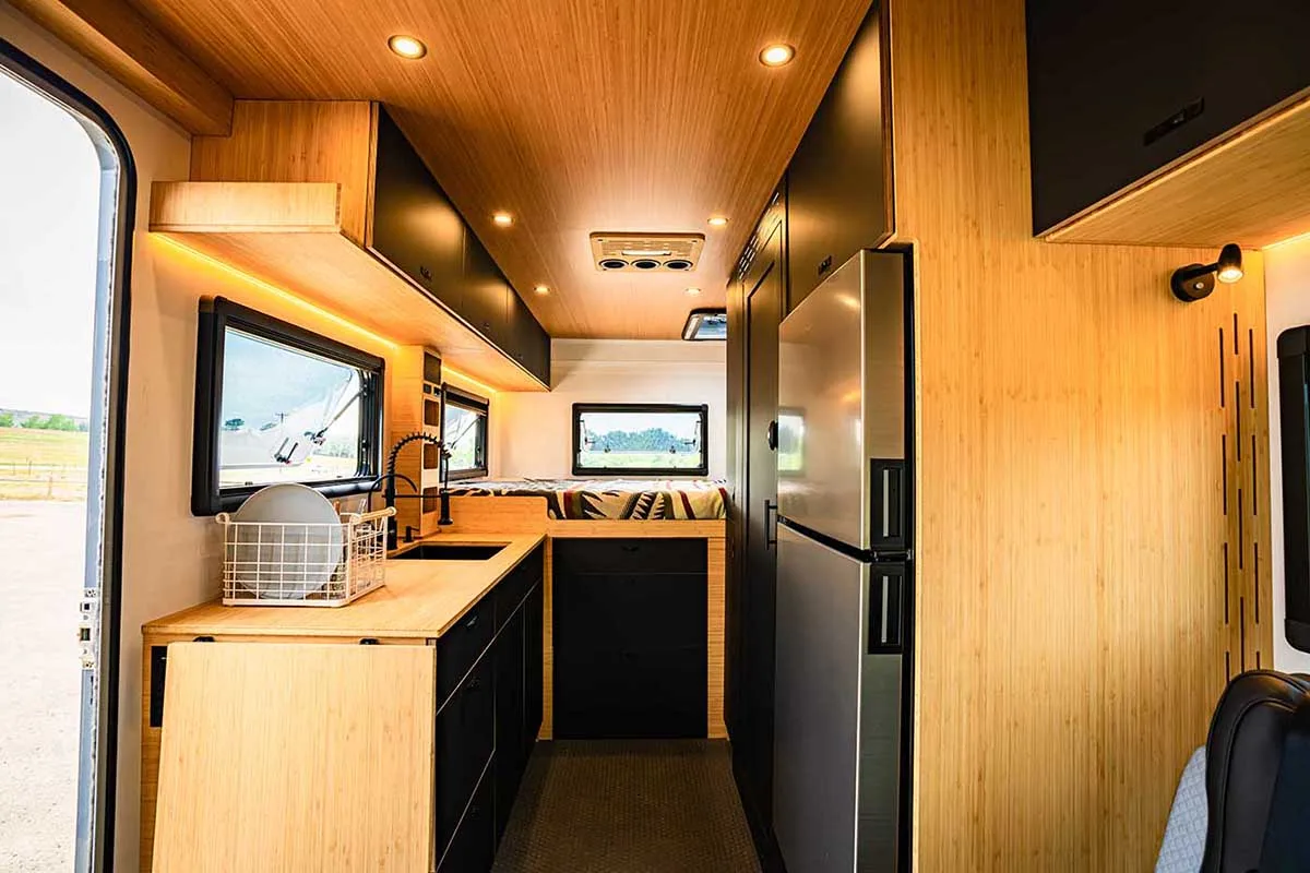 Geotrek Verus interior showing the kitchen and rear bed