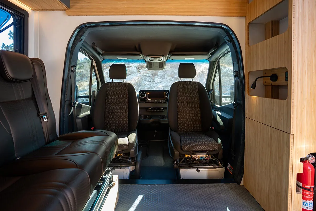 Geotrek Verus interior from the bed showing double jump seats and swiveled front seats