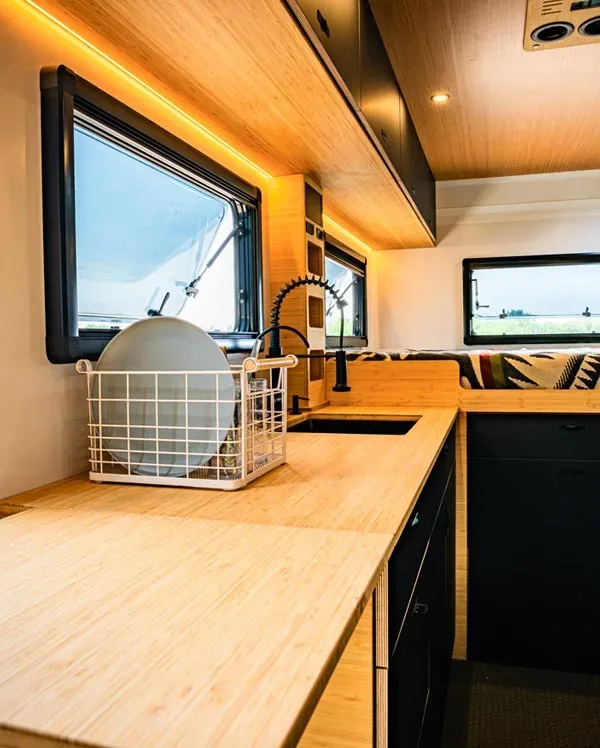 Geotrek Verus kitchen with dishes on the counter and window open